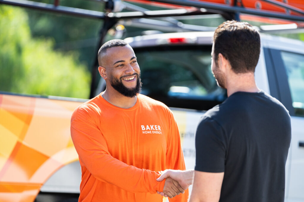 Baker Employee shaking hands with a customer